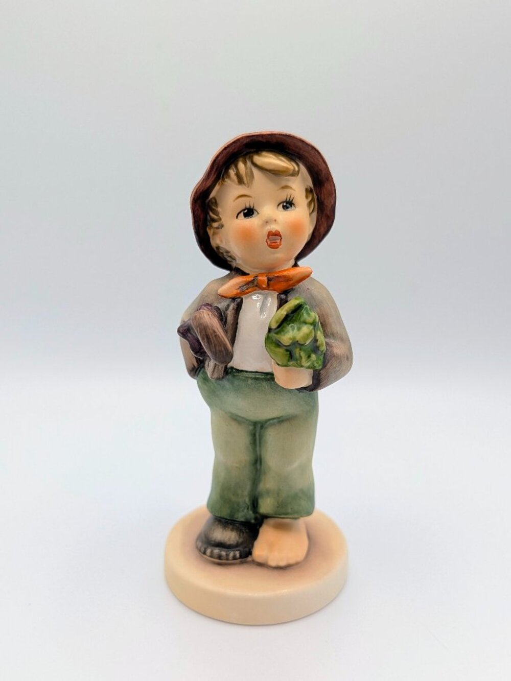 M.I. Hummel Figurine Titled "Lost Stocking" #374 - Vintage and Collectible